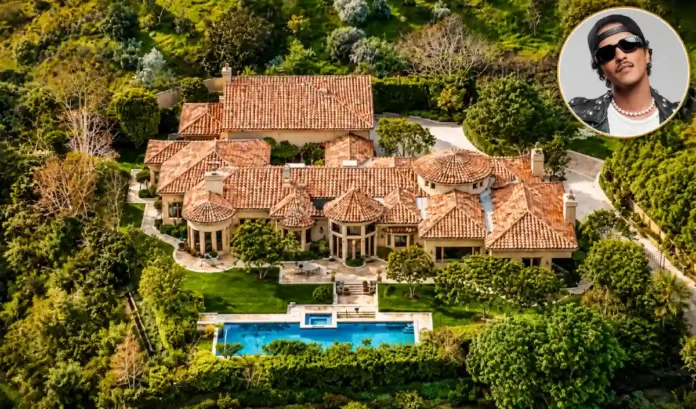 Bruno Mars house featuring a luxury Mediterranean mansion with a private pool