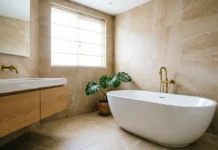 11 Amazing Bathroom Tile Ideas to Make Your Space Look Stylish & Expensive Bathroom tile ideas featuring elegant neutral tiles in a luxury modern bathroom
