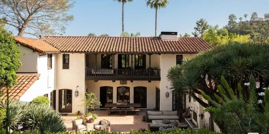 Spanish Colonial Revival facade of the Seyler House in Los Feliz with white stucco walls and a red tile roof
