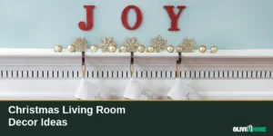 Christmas living room decor ideas shown on a decorated mantel, with gold ornaments, snowflake decorations and three hanging stockings above a fireplace.